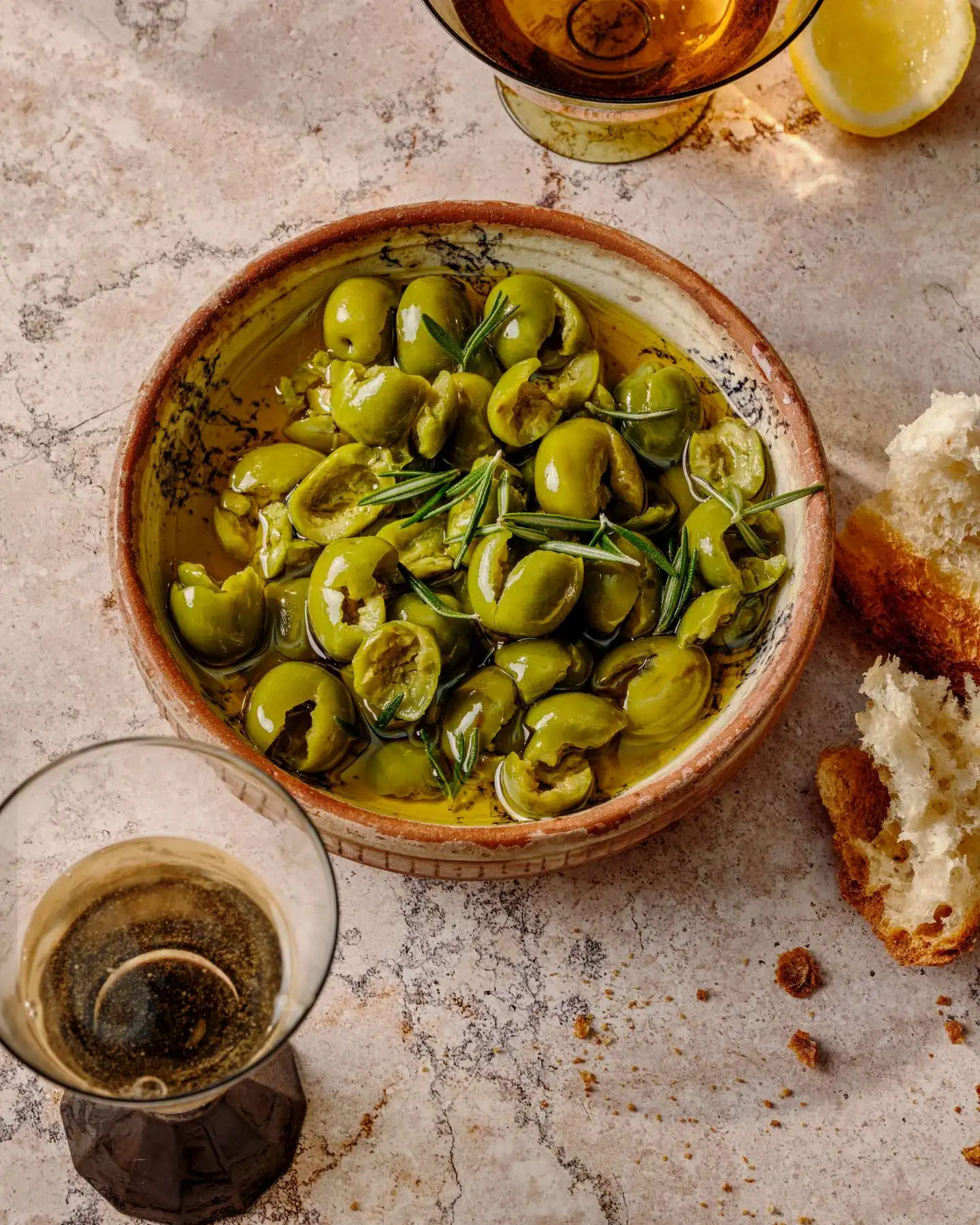 Warm Marinated Castelvetrano Olives with Garlic and Rosemary recipe by Casa de Suna