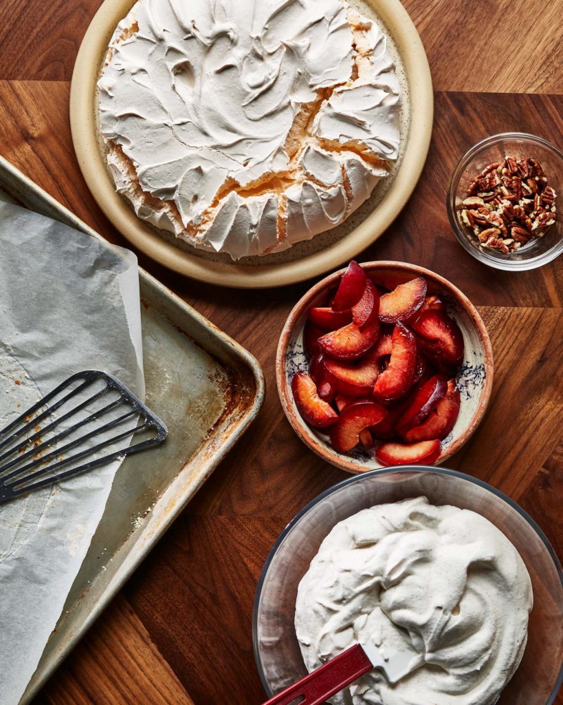 Red Plum Pavlova with Spiced Cream