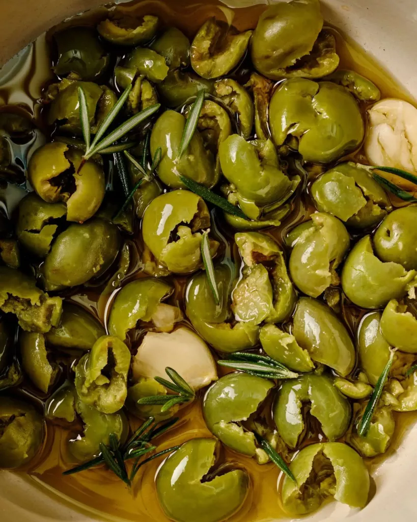 Warm Marinated Castelvetrano Olives with Garlic and Rosemary recipe by Casa de Suna